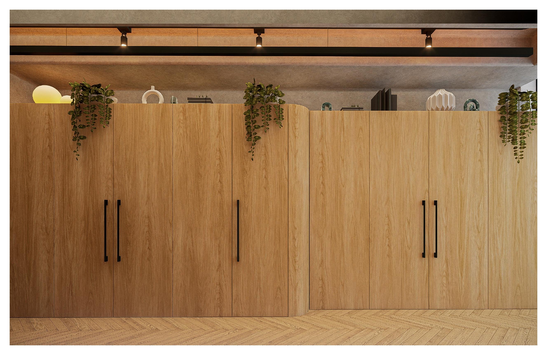Closets de madera natural con iluminación superior y plantas decorativas